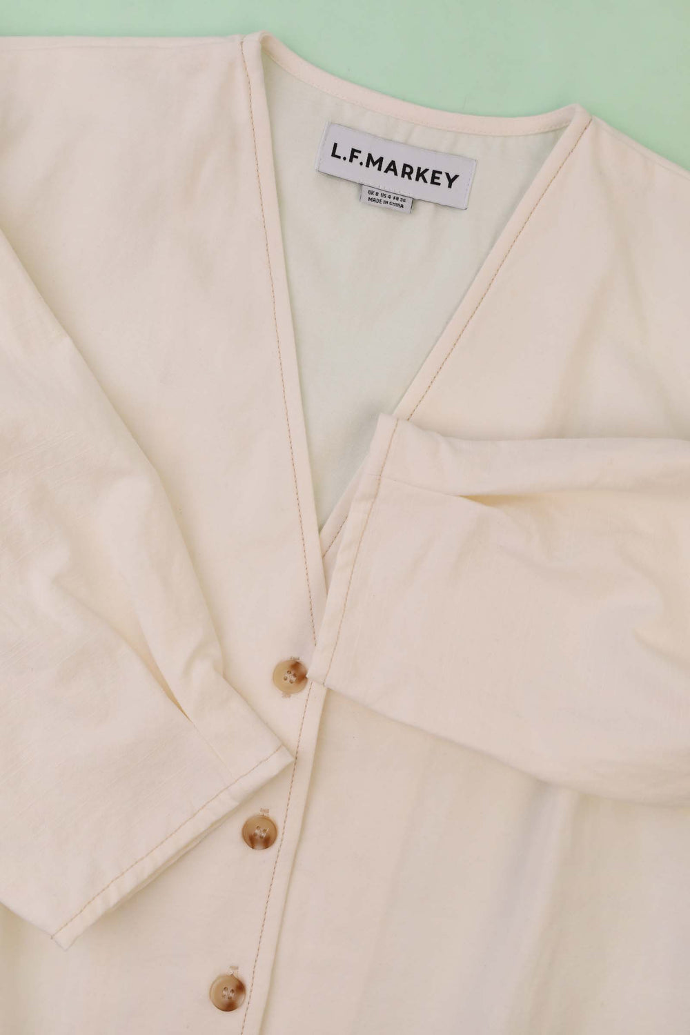 ローリートップエクリュ